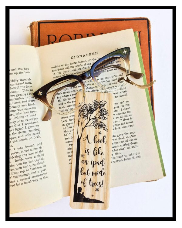 A book is like an iPad, but made of trees. - Wood Bookmark Online